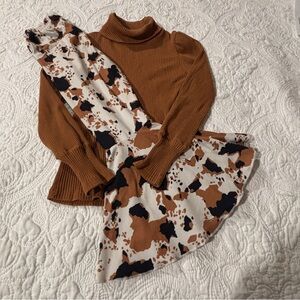 Brown Turtleneck Sweater with Patterned Scarf
